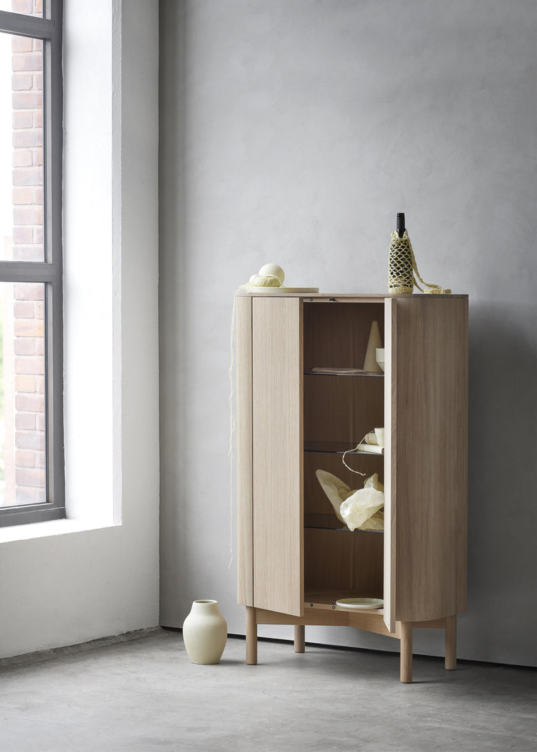 Loud tall cabinet light oak window ph Chris Tonnesen